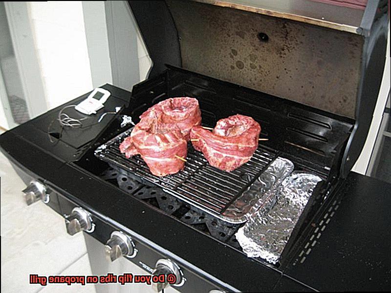 Do you flip ribs on propane grill-4