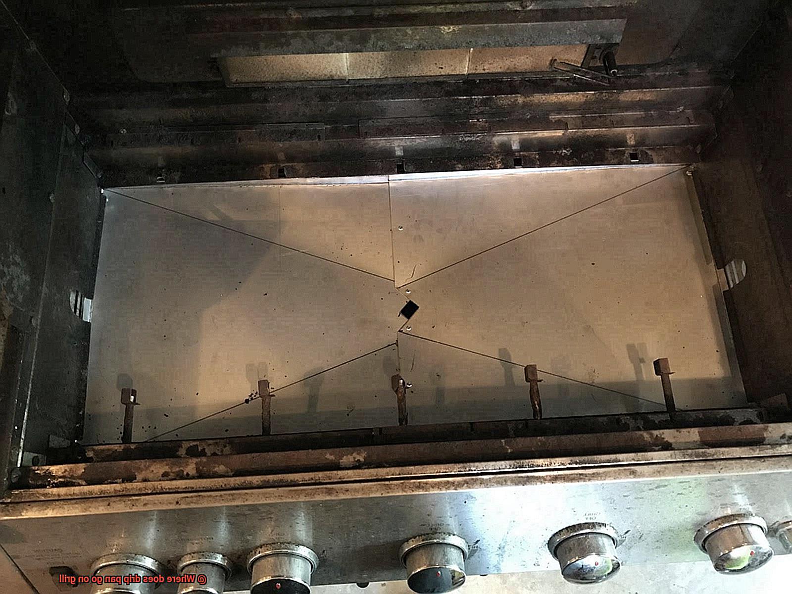 Where does drip pan go on grill-2