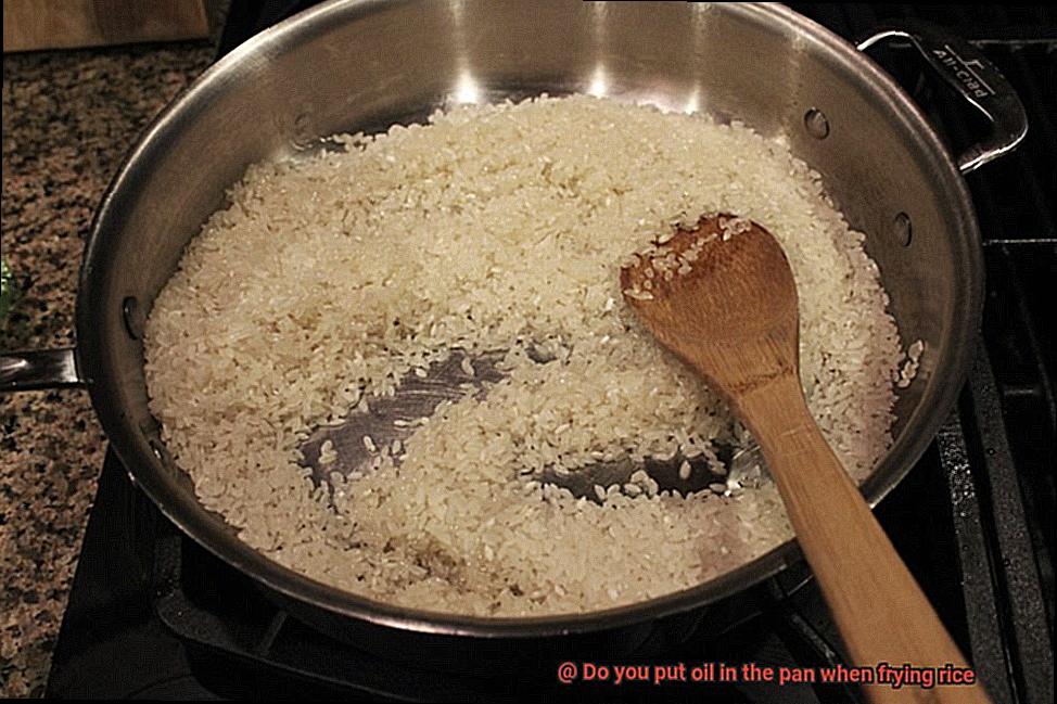 Do you put oil in the pan when frying rice-2